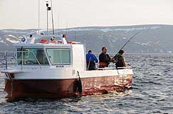 Grupa na łodzi w trakcie połowów, okolice NordKapp